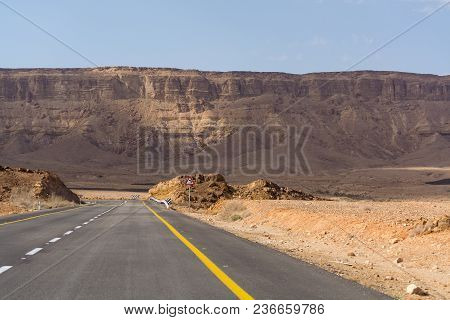 Asphalt Road In Desert Negev, Israel, Road 40, Transport Infrastructure In Desert, Scenic Mountains