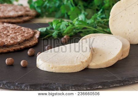 Dietary Homemade Chicken Mortadella With Spices On Slate Board. Protein Rye Multicereal Flatbread. W