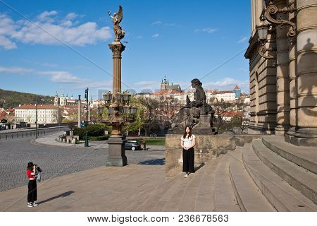 Prague, Czech Republic - April 14, 2018: Two Young Japanese Tourists Take Pfoto By Rudolfinum Near P