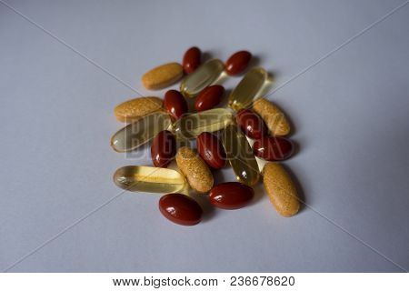 Capsules Of Lutein, Fish Oil And Multivitamins