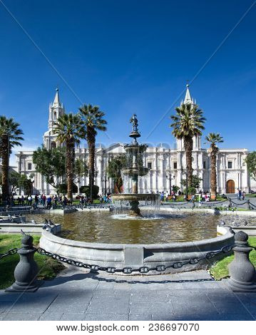 AREQUIPA PERU NOVEMBER 9: Main square of Arequipa with church on november 9 2015 in Arequipa Peru. Arequipa's Plaza de Armas is one of the most beautiful in Peru.