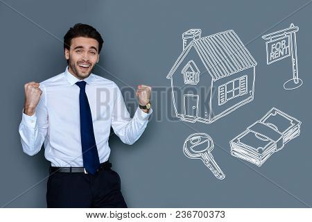 Excited Realtor. Cheerful Professional Realtor Feeling Happy After Selling A Fashionable House In Th