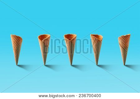 Ice Cream Cones Pattern. Turquoise Background. Sweet, Summer And Empty Concept. Top View. Flat Lay. 