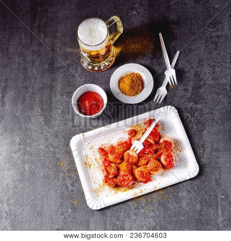 A Fresh And Tasty Curry Bockwurst With Beer