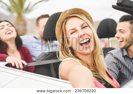 Happy Friends Making A Selfie In Convertible Car On Summer Vacation - Young People Having Fun With N