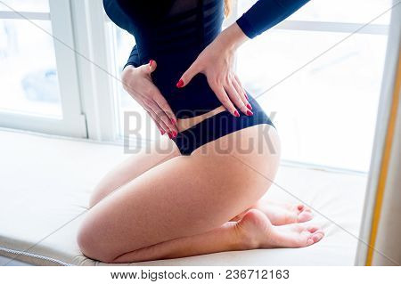 A Portrait Of A Beauriful Woman In A Lingerie
