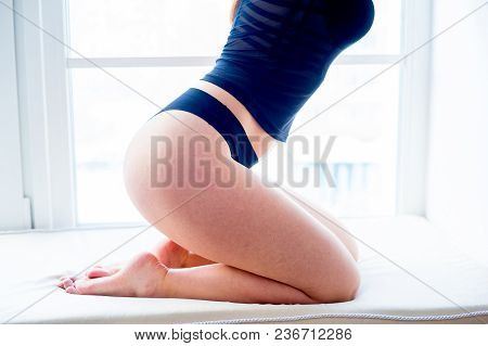 A Portrait Of A Beauriful Woman In A Lingerie