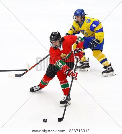 Kyiv, Ukraine - April 17, 2018: Bence Dezsi Of Hungary (l) Fights For A Puck With Bohdan Serednitsky