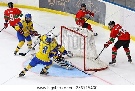 Kyiv, Ukraine - April 17, 2018: Ukrainian Players (in Yellow) Defends Their Net During The Iihf 2018