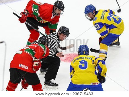 Kyiv, Ukraine - April 17, 2018: Referee Face-off The Rink During The Iihf 2018 Ice Hockey U18 World 