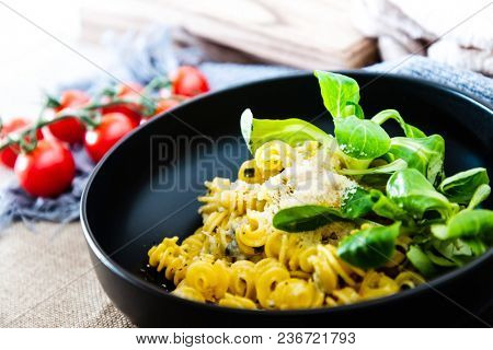 Radiatori pasta in a creamy tomato parmesan cheese sauce