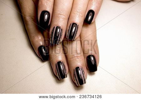 Black Nail Polish. Manicured Nail With Black Nail Polish. Manicure With Dark Nailpolish. Black Nail 