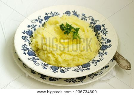 Appetizing Mashed Potatoes With Butter And Parsley. Rustic Style, Selective Focus.