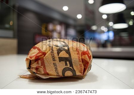 Minsk, Belarus, March 27, 2018: Sandwich With Kfc Logo On Table In Kfc Restaurant