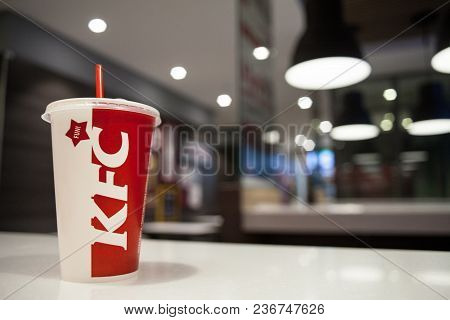Minsk, Belarus, March 27, 2018: Paper Cup With Kfc Logo On Table In Kfc Restaurant