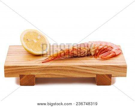 Argentine Red Shrimp On A Wooden Bred. Shrimp And Lemon Flatlay