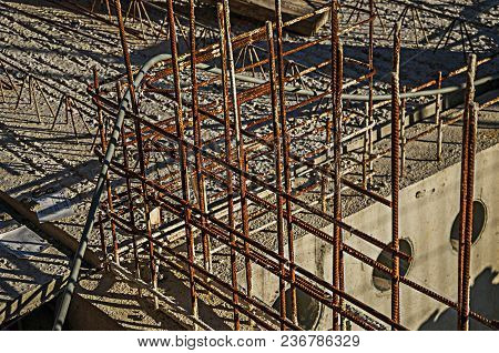 Tielt, Western Belgium - July 02, 2017. Close-up Of Concrete Floor And Steel Bars In A Construction 