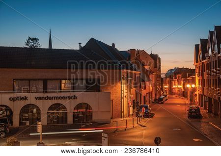 Tielt, Belgium - July 02, 2017. Night View Of Street With Houses At Dusk In Tielt. Charming And Quie