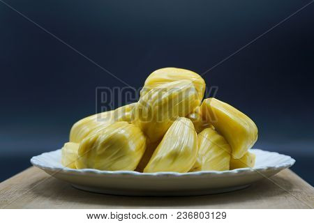 Fresh Jackfruit Slices On A White Plate. Sweet Yellow Jackfruit Ripe. Vegetarian, Vegan, Raw Food. E