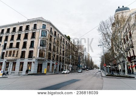 Madrid, Spain - April 7, 2018:  Serrano Street In Salamanca District A Cloudy Day. Salamanca Is Well