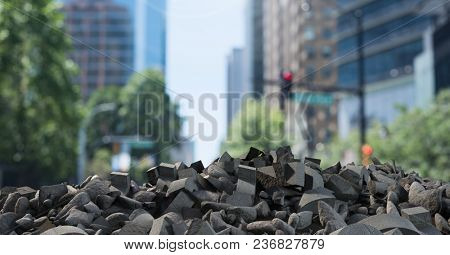 Broken concrete rubble in cityscape