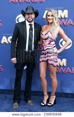 LAS VEGAS-APR 15: Singer Jason Aldean and Brittany Kerr  attend the 53rd Annual Academy of Country Music Awards on April 15, 2018 at the MGM Grand Arena in Las Vegas, Nevada.