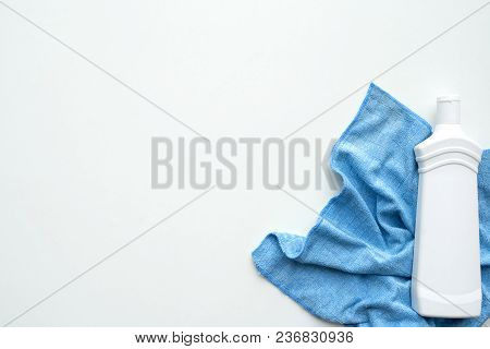 Cleaning Cloth And Detergent On White Background