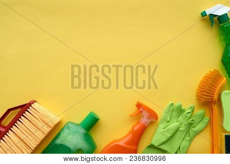 Yellow Cleaning Background With Detergents And Brushes