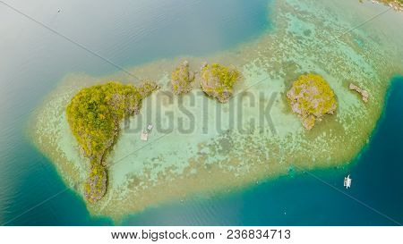Aerial View Of Small Islands Siete Pecados Near In Coron Bay. Palawan. Overcast.