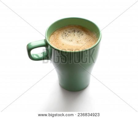 Close Up Green Mug Cup Of Black Coffee On A White Background