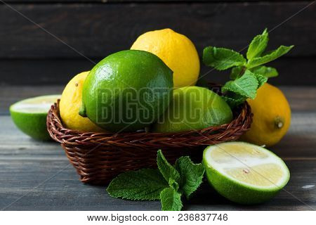 Fresh Citrus And Mint In A Wooden Basket