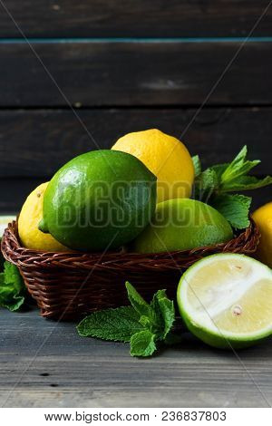 Fresh Citrus And Mint In A Wooden Basket
