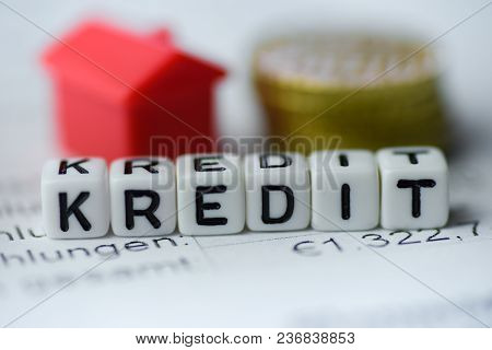 German Word Credit Formed By Alphabet Blocks: Kredit Real Estate Business