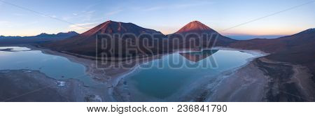 Volcano of Licancabur aerial view. Sunrise aerial panorama of the volcano of Licancabur, Laguna Verde and Laguna Blanca. Bolivia