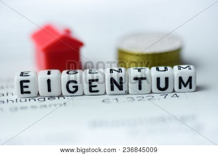 German Word Property Formed By Alphabet Blocks: Eigentum Real Estate Business