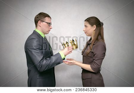 The Businessman Holds The Gold Crown As Symbol Of Power And Giving It To His Receiver. Change Of Pow