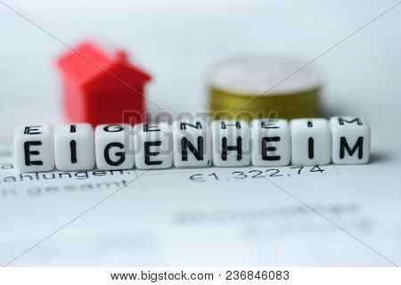 German Word Home Ownership Formed By Alphabet Blocks: Eigenheim Real Estate Business