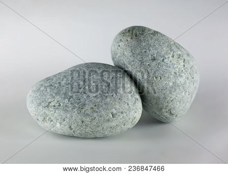 Two Pebbles Stone Isolated On White Background. Jadeite Stone.