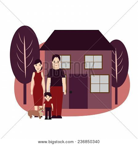 Happy Family Standing Together With Their Corgi