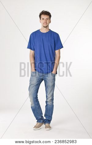Relaxing Guy Posing To Camera. Full Length Portrait
