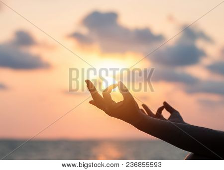Mantra Yoga Meditation Practice With Silhouette Of Woman In Lotus Pose Having Peaceful Mind Relaxati