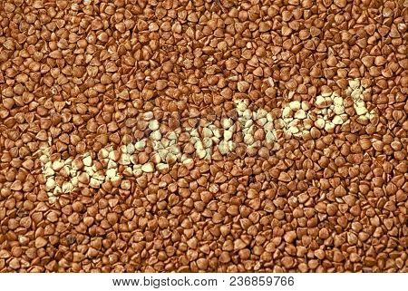 Texture Of Fresh Clean Useful Buckwheat Groats Grain Close-up. Healthy Dietary Food Rich In Microele