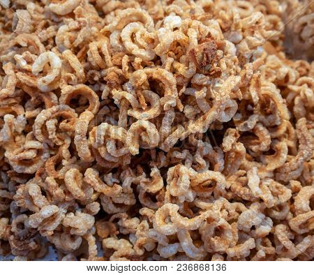 Closed Up Crispy Pork Rinds, Deep Fried Pork Skin Appetizer Or  Snack Base For Background And Textur