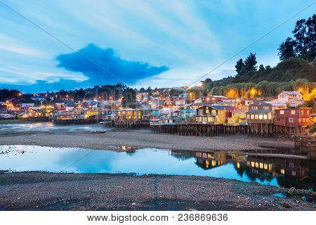 Traditional Stilt Houses Know As Palafitos In The City Of Castro At Chiloe Island In Southern Chile