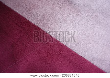 Diagonal Seam Between Pink And Red Artificial Suede