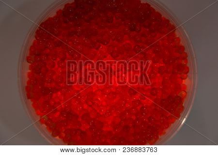Red Caviar Salmon In A Jar On A White Background