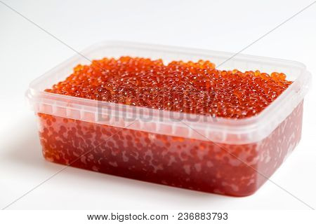 Red Caviar Salmon In A Jar On A White Background