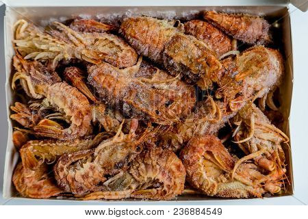 Shrimp Langoustine Lie On A White Background