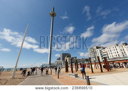 Brighton, United Kingdom - August 1, 2017: Tourists Admire The Amazing View Of English Channel From 