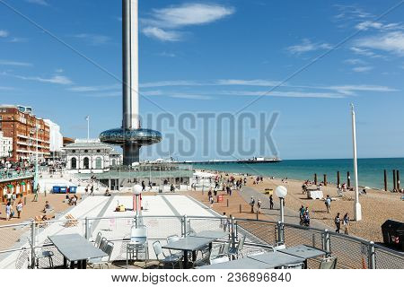 Brighton, United Kingdom - August 1, 2017: Tourists Admire The Amazing View Of English Channel From 